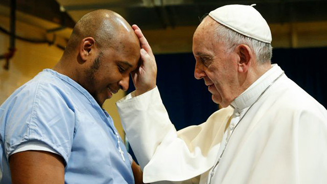 Visiting prison, pope says all people need forgiveness